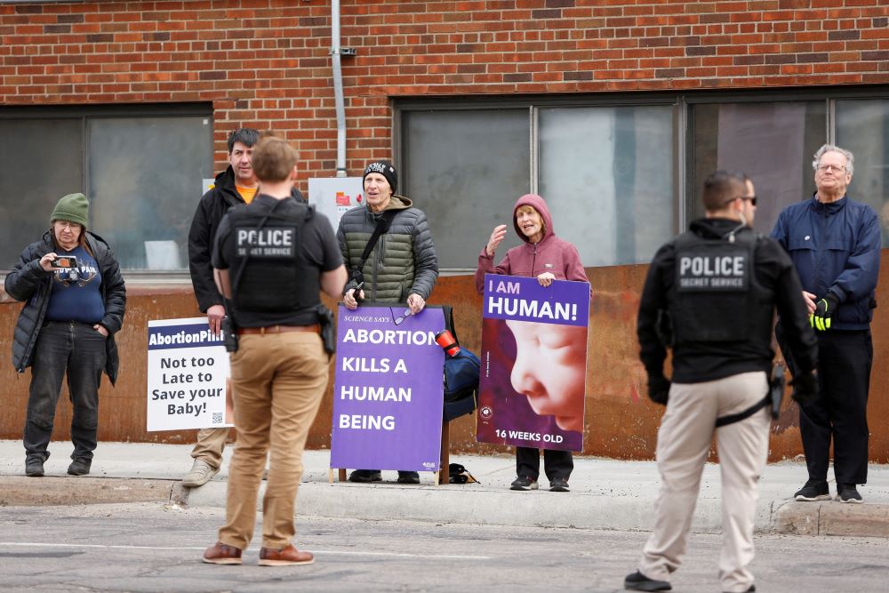 Abortion opponents demonstrate as U.S. Vice President Kamala Harris visits an abortion clinic in Minneapolis March 14. (OSV News/Reuters/Nicole Neri) Abortion opponents demonstrate as U.S. Vice President Kamala Harris visits an abortion clinic in Minneapolis March 14. (OSV News/Reuters/Nicole Neri)